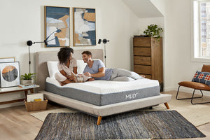 Mlily Fusion Luxe with couple sitting on bed